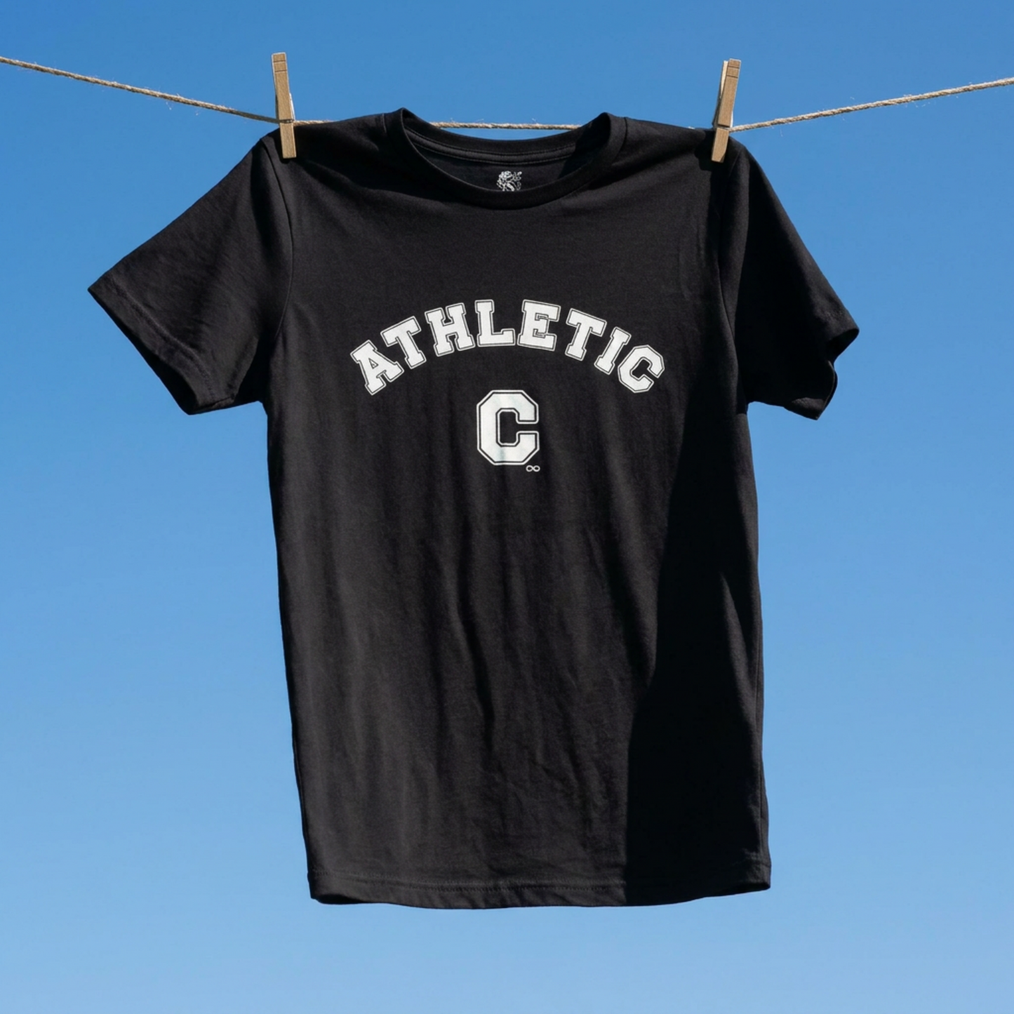 Front view of a black unisex eco-friendly t-shirt featuring a white vintage varsity-style 'Athletic C' graphic design.