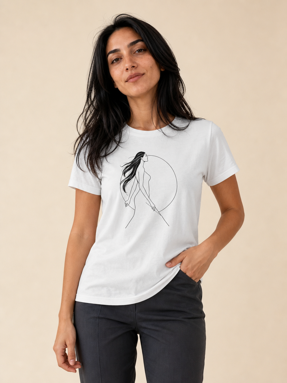 A woman modeling a white short-sleeve t-shirt with a minimalist black line art graphic of a female figure inside a circle, set against a solid beige background.