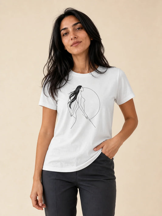 A woman modeling a white short-sleeve t-shirt with a minimalist black line art graphic of a female figure inside a circle, set against a solid beige background.
