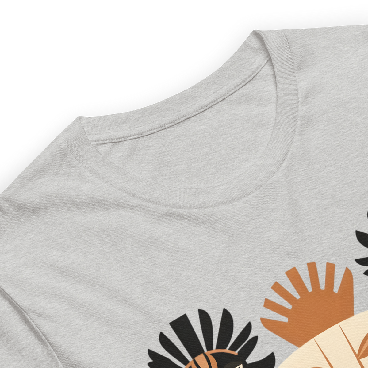 Front view of an athletic heather grey streetwear t-shirt featuring a striking geometric tribal mask graphic in terracotta, cream, and black.