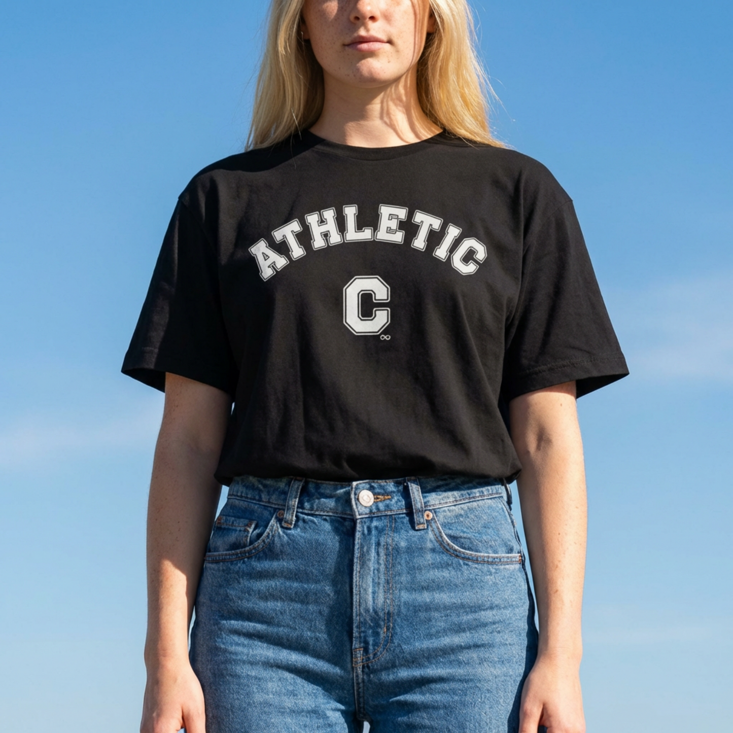 Front view of a black unisex eco-friendly t-shirt featuring a white vintage varsity-style 'Athletic C' graphic design.