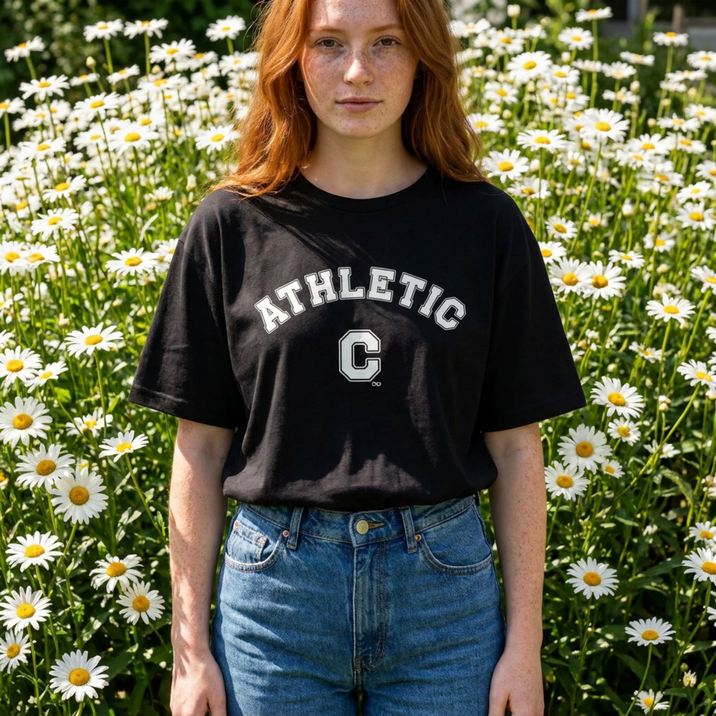 Front view of a black unisex eco-friendly t-shirt featuring a white vintage varsity-style 'Athletic C' graphic design.